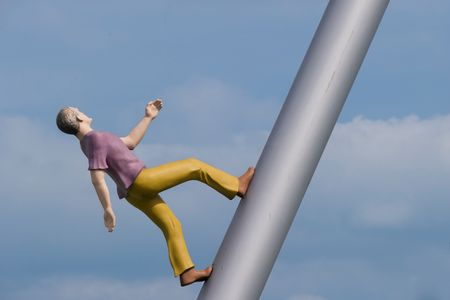 Eine männliche Figur läuft auf einem Roh Richtung Himmel